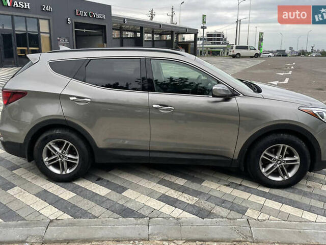 Серый Хендай Санта Фе, объемом двигателя 2.36 л и пробегом 97 тыс. км за 12700 $, фото 3 на Automoto.ua