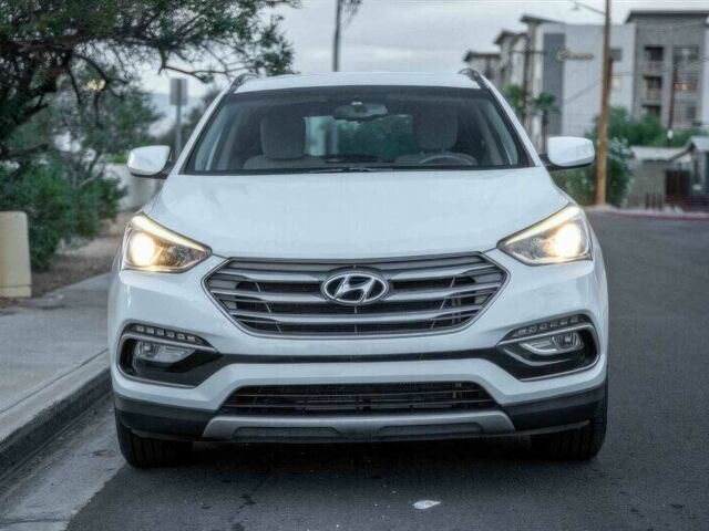 Серый Хендай Санта Фе, объемом двигателя 2.4 л и пробегом 54 тыс. км за 11500 $, фото 1 на Automoto.ua