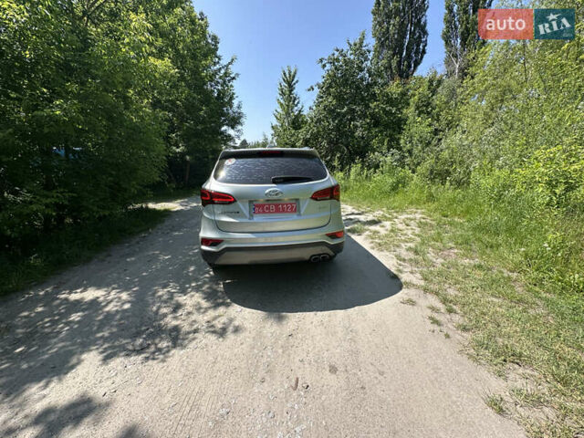 Серый Хендай Санта Фе, объемом двигателя 2 л и пробегом 150 тыс. км за 21899 $, фото 8 на Automoto.ua