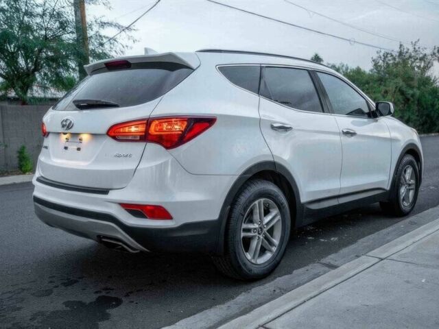 Серый Хендай Санта Фе, объемом двигателя 2.4 л и пробегом 54 тыс. км за 11500 $, фото 7 на Automoto.ua