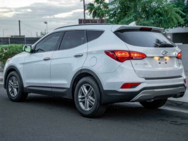 Серый Хендай Санта Фе, объемом двигателя 2.4 л и пробегом 54 тыс. км за 11500 $, фото 5 на Automoto.ua