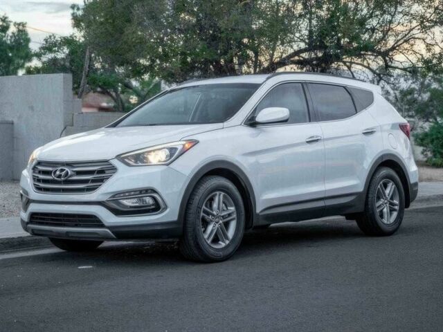 Серый Хендай Санта Фе, объемом двигателя 2.4 л и пробегом 54 тыс. км за 11500 $, фото 2 на Automoto.ua