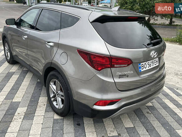 Серый Хендай Санта Фе, объемом двигателя 2.36 л и пробегом 97 тыс. км за 12700 $, фото 9 на Automoto.ua