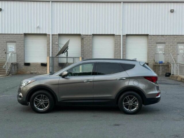 Сірий Хендай Санта Фе, об'ємом двигуна 2.4 л та пробігом 70 тис. км за 8900 $, фото 3 на Automoto.ua