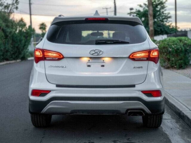 Серый Хендай Санта Фе, объемом двигателя 2.4 л и пробегом 54 тыс. км за 11500 $, фото 6 на Automoto.ua