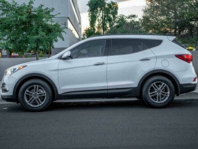 Серый Хендай Санта Фе, объемом двигателя 2.4 л и пробегом 54 тыс. км за 11500 $, фото 4 на Automoto.ua