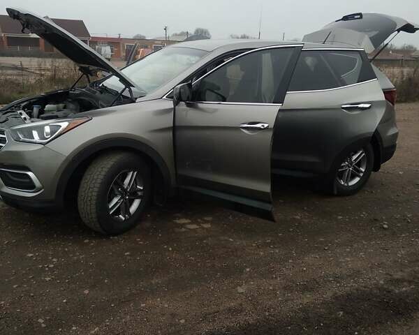 Серый Хендай Санта Фе, объемом двигателя 2.36 л и пробегом 182 тыс. км за 16500 $, фото 12 на Automoto.ua