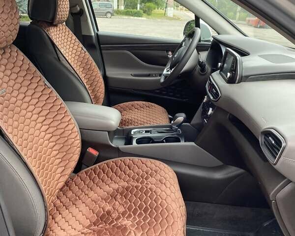 Серый Хендай Санта Фе, объемом двигателя 2.36 л и пробегом 69 тыс. км за 23500 $, фото 29 на Automoto.ua