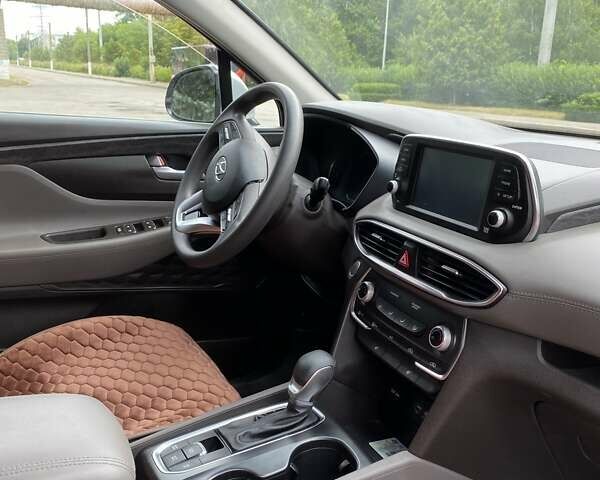 Серый Хендай Санта Фе, объемом двигателя 2.36 л и пробегом 69 тыс. км за 23500 $, фото 27 на Automoto.ua