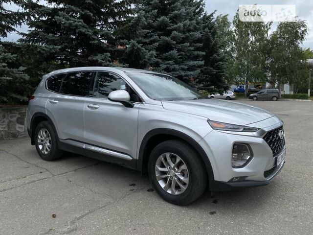 Серый Хендай Санта Фе, объемом двигателя 2.36 л и пробегом 69 тыс. км за 23500 $, фото 2 на Automoto.ua