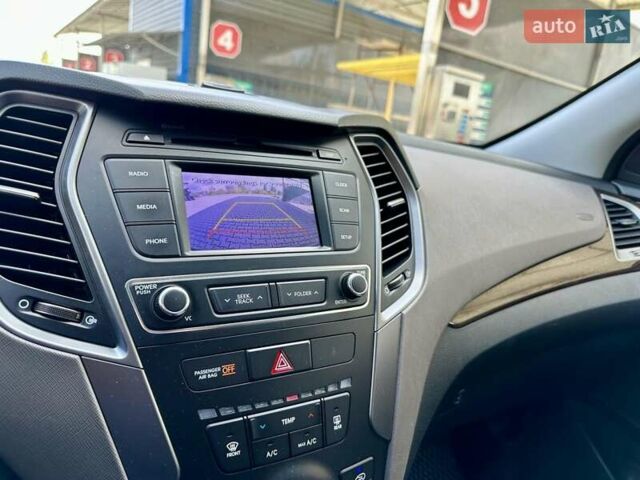 Серый Хендай Санта Фе, объемом двигателя 2.36 л и пробегом 112 тыс. км за 14900 $, фото 16 на Automoto.ua