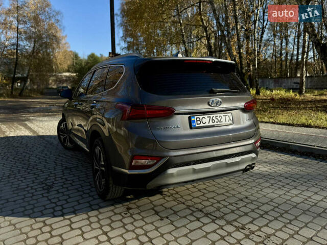 Серый Хендай Санта Фе, объемом двигателя 2 л и пробегом 148 тыс. км за 24400 $, фото 2 на Automoto.ua