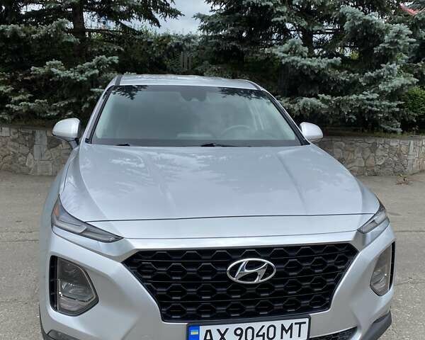 Серый Хендай Санта Фе, объемом двигателя 2.36 л и пробегом 69 тыс. км за 23500 $, фото 1 на Automoto.ua