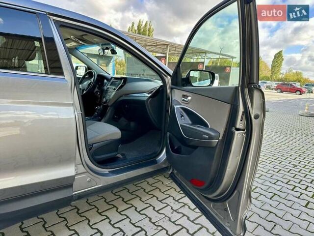 Серый Хендай Санта Фе, объемом двигателя 2.36 л и пробегом 112 тыс. км за 14900 $, фото 2 на Automoto.ua