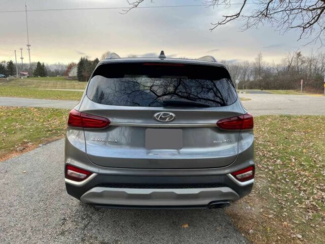 Серый Хендай Санта Фе, объемом двигателя 2 л и пробегом 36 тыс. км за 9500 $, фото 5 на Automoto.ua