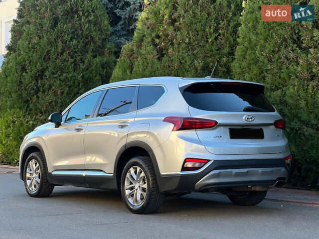 Серый Хендай Санта Фе, объемом двигателя 2.36 л и пробегом 126 тыс. км за 16900 $, фото 9 на Automoto.ua