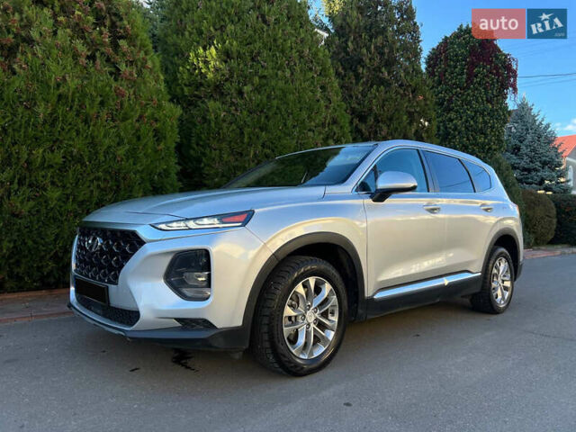 Серый Хендай Санта Фе, объемом двигателя 2.36 л и пробегом 126 тыс. км за 16900 $, фото 4 на Automoto.ua