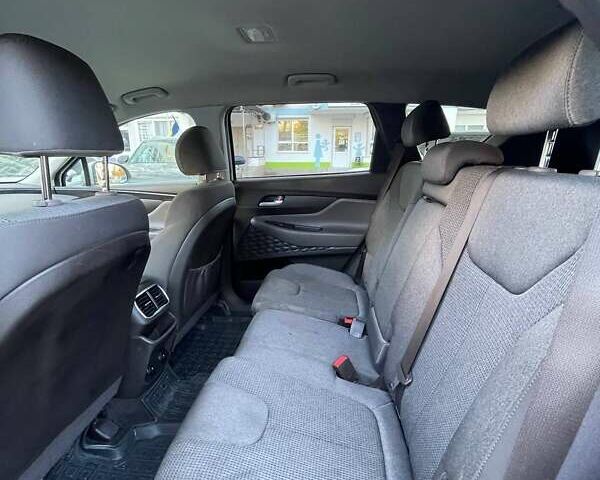 Серый Хендай Санта Фе, объемом двигателя 2.36 л и пробегом 205 тыс. км за 17500 $, фото 14 на Automoto.ua