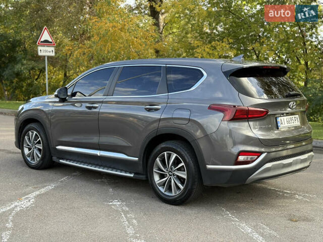 Серый Хендай Санта Фе, объемом двигателя 2 л и пробегом 200 тыс. км за 25000 $, фото 3 на Automoto.ua