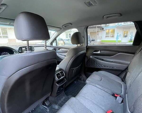 Серый Хендай Санта Фе, объемом двигателя 2.36 л и пробегом 205 тыс. км за 17500 $, фото 13 на Automoto.ua