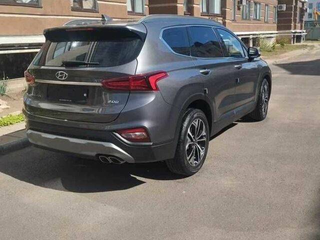 Серый Хендай Санта Фе, объемом двигателя 2 л и пробегом 86 тыс. км за 23000 $, фото 3 на Automoto.ua