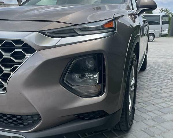 Серый Хендай Санта Фе, объемом двигателя 2.36 л и пробегом 99 тыс. км за 19800 $, фото 1 на Automoto.ua