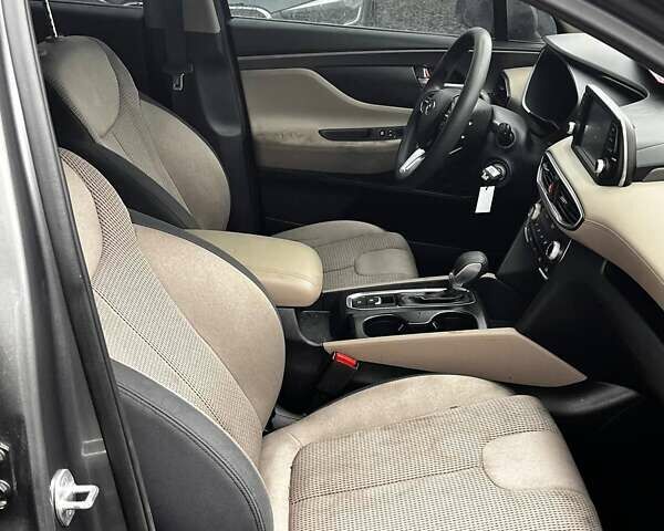 Серый Хендай Санта Фе, объемом двигателя 2.4 л и пробегом 164 тыс. км за 15200 $, фото 24 на Automoto.ua