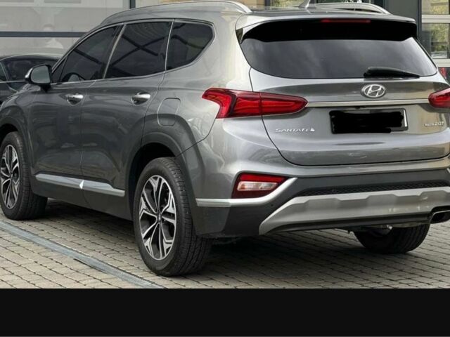 Серый Хендай Санта Фе, объемом двигателя 2 л и пробегом 146 тыс. км за 25000 $, фото 2 на Automoto.ua