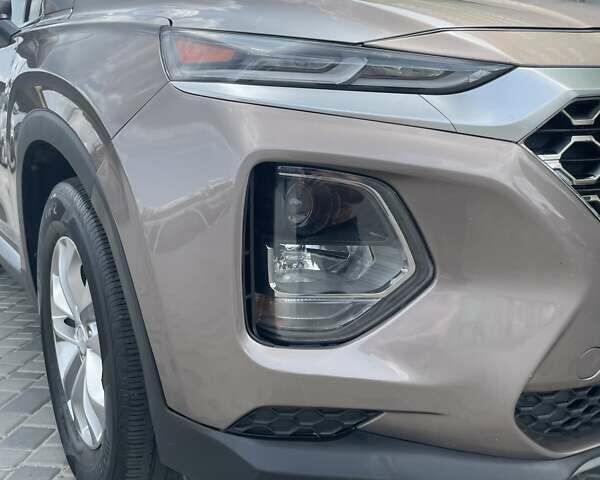 Серый Хендай Санта Фе, объемом двигателя 2.36 л и пробегом 99 тыс. км за 19800 $, фото 2 на Automoto.ua