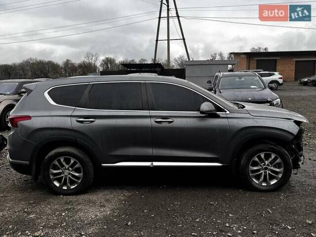 Серый Хендай Санта Фе, объемом двигателя 2.4 л и пробегом 164 тыс. км за 15200 $, фото 3 на Automoto.ua