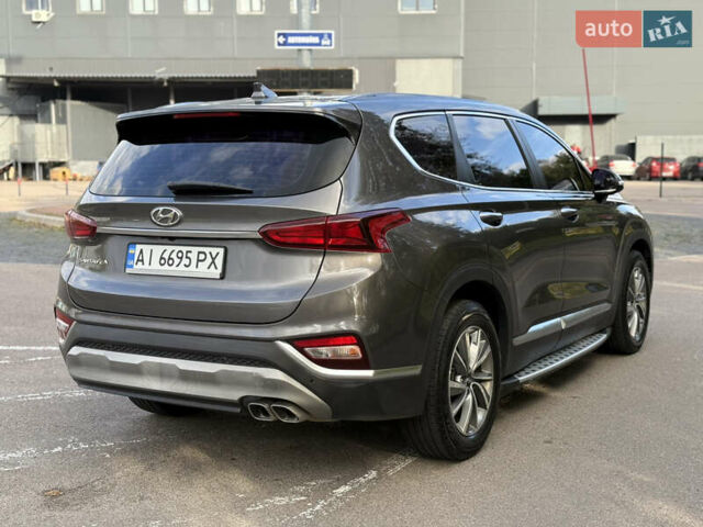 Серый Хендай Санта Фе, объемом двигателя 2 л и пробегом 200 тыс. км за 25000 $, фото 6 на Automoto.ua