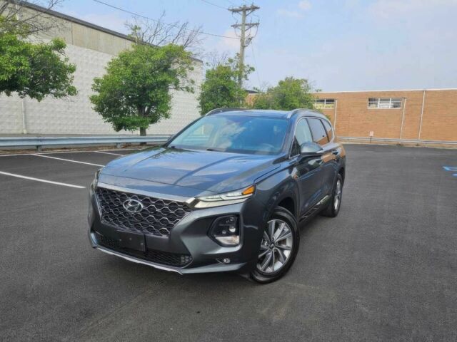 Серый Хендай Санта Фе, объемом двигателя 2.4 л и пробегом 34 тыс. км за 13000 $, фото 2 на Automoto.ua