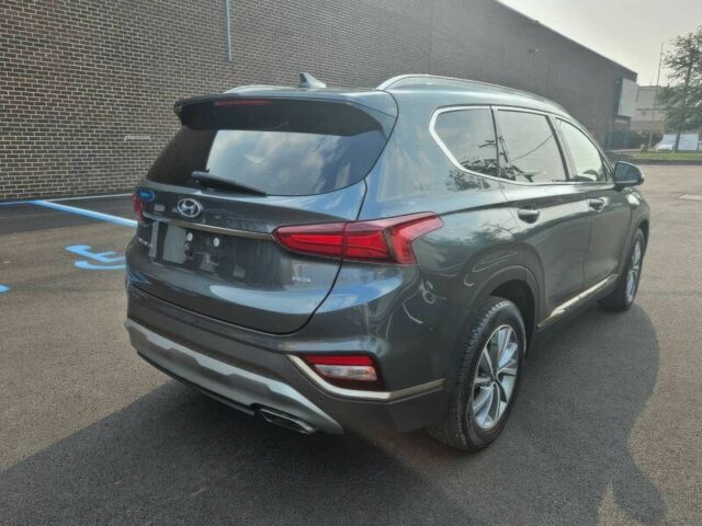 Серый Хендай Санта Фе, объемом двигателя 2.4 л и пробегом 34 тыс. км за 13000 $, фото 5 на Automoto.ua