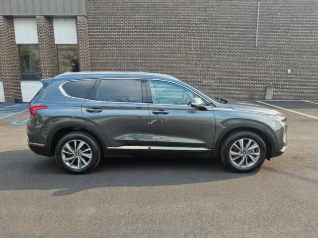 Серый Хендай Санта Фе, объемом двигателя 2.4 л и пробегом 34 тыс. км за 13000 $, фото 3 на Automoto.ua