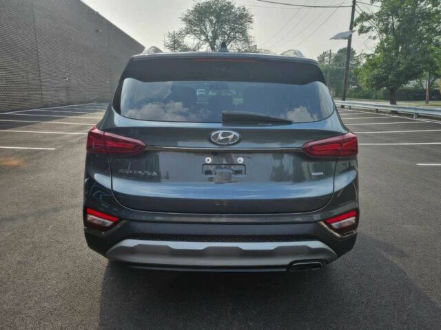 Серый Хендай Санта Фе, объемом двигателя 2.4 л и пробегом 34 тыс. км за 13000 $, фото 6 на Automoto.ua