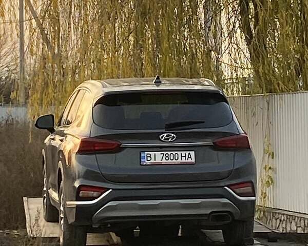 Серый Хендай Санта Фе, объемом двигателя 2 л и пробегом 150 тыс. км за 19800 $, фото 3 на Automoto.ua