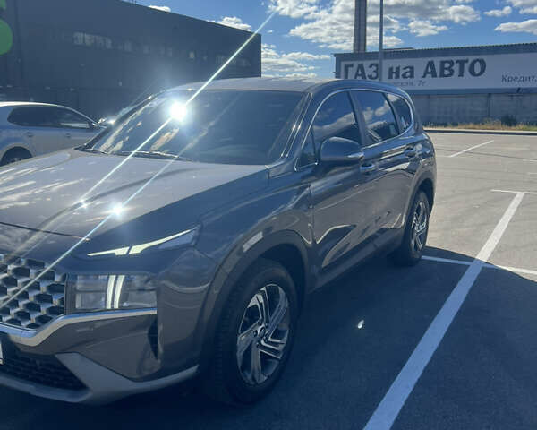 Серый Хендай Санта Фе, объемом двигателя 2.15 л и пробегом 73 тыс. км за 32900 $, фото 2 на Automoto.ua