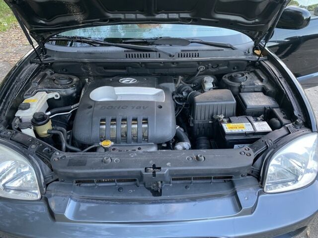 Синий Хендай Санта Фе, объемом двигателя 2.4 л и пробегом 145 тыс. км за 3900 $, фото 6 на Automoto.ua