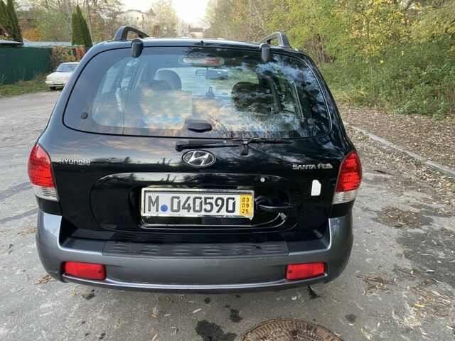 Синий Хендай Санта Фе, объемом двигателя 2.4 л и пробегом 145 тыс. км за 3900 $, фото 2 на Automoto.ua