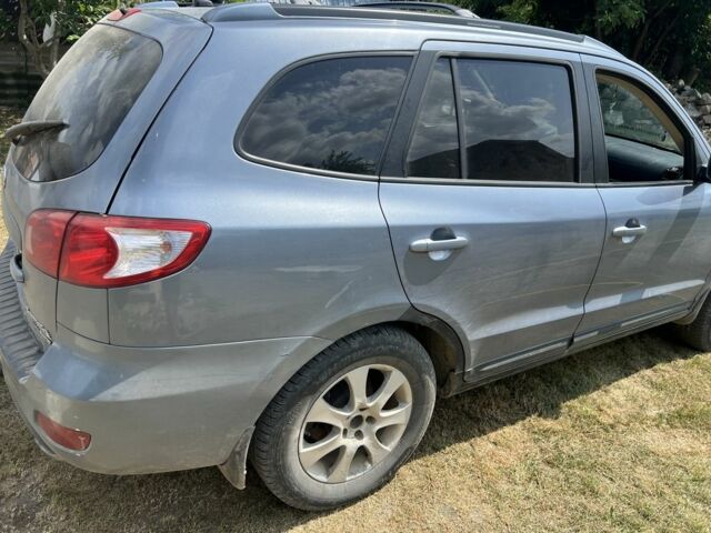 Синий Хендай Санта Фе, объемом двигателя 2.2 л и пробегом 265 тыс. км за 3500 $, фото 4 на Automoto.ua