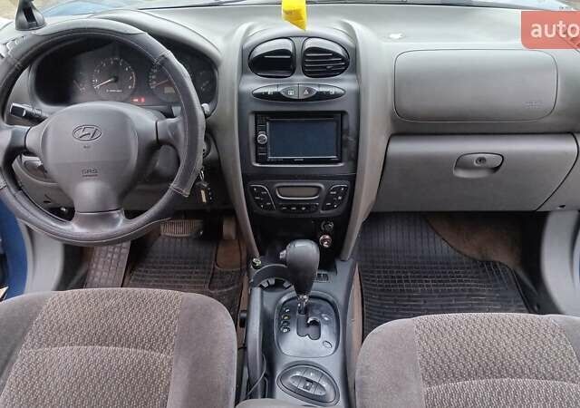 Синий Хендай Санта Фе, объемом двигателя 2.66 л и пробегом 300 тыс. км за 2350 $, фото 10 на Automoto.ua