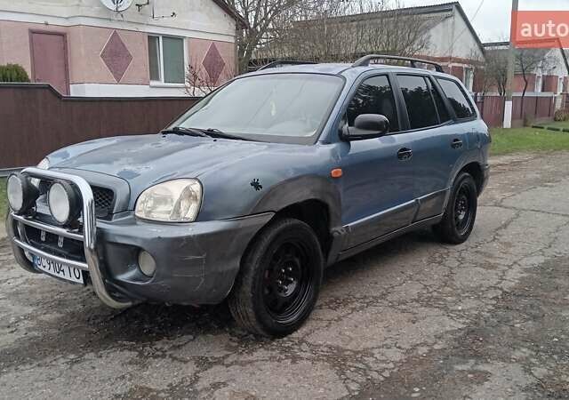 Синий Хендай Санта Фе, объемом двигателя 2.66 л и пробегом 300 тыс. км за 2350 $, фото 1 на Automoto.ua