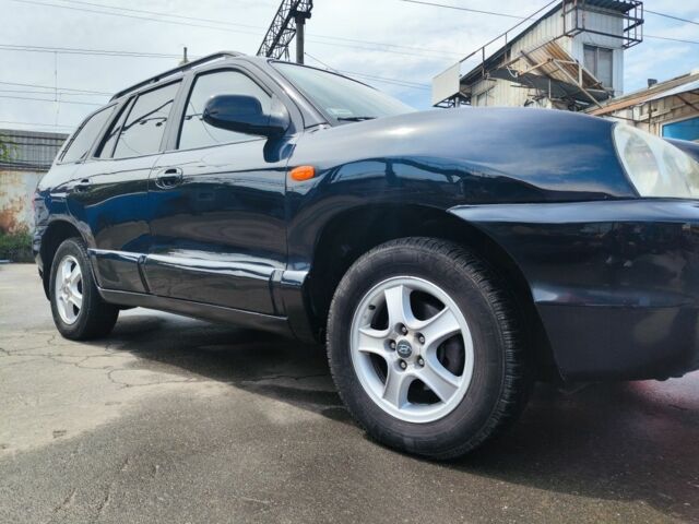 Синий Хендай Санта Фе, объемом двигателя 2 л и пробегом 370 тыс. км за 5999 $, фото 2 на Automoto.ua