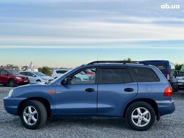 Синий Хендай Санта Фе, объемом двигателя 1.6 л и пробегом 232 тыс. км за 6890 $, фото 4 на Automoto.ua