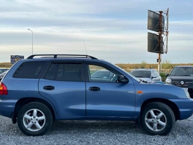 Синий Хендай Санта Фе, объемом двигателя 2 л и пробегом 232 тыс. км за 7000 $, фото 4 на Automoto.ua