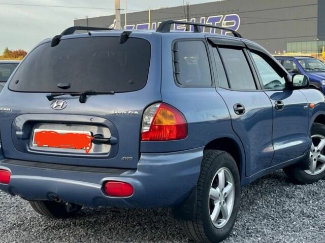 Синий Хендай Санта Фе, объемом двигателя 2 л и пробегом 232 тыс. км за 7000 $, фото 3 на Automoto.ua