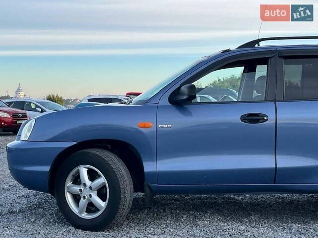 Синий Хендай Санта Фе, объемом двигателя 2 л и пробегом 232 тыс. км за 6890 $, фото 3 на Automoto.ua