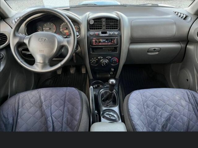 Синий Хендай Санта Фе, объемом двигателя 2 л и пробегом 232 тыс. км за 7000 $, фото 5 на Automoto.ua