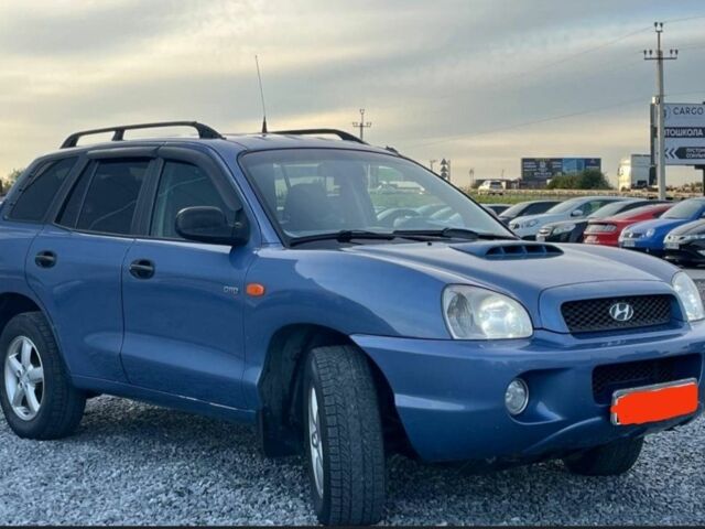 Синий Хендай Санта Фе, объемом двигателя 2 л и пробегом 232 тыс. км за 7000 $, фото 2 на Automoto.ua
