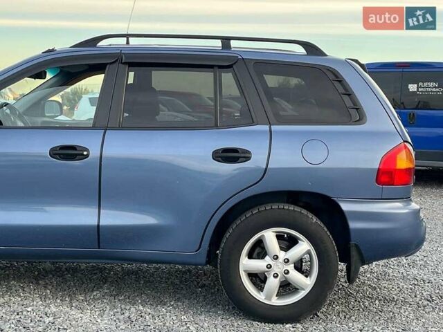 Синий Хендай Санта Фе, объемом двигателя 2 л и пробегом 232 тыс. км за 6890 $, фото 5 на Automoto.ua